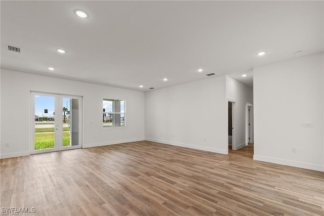 unfurnished room featuring light wood-type flooring