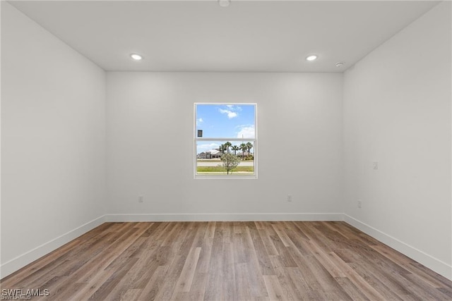 empty room featuring light hardwood / wood-style floors