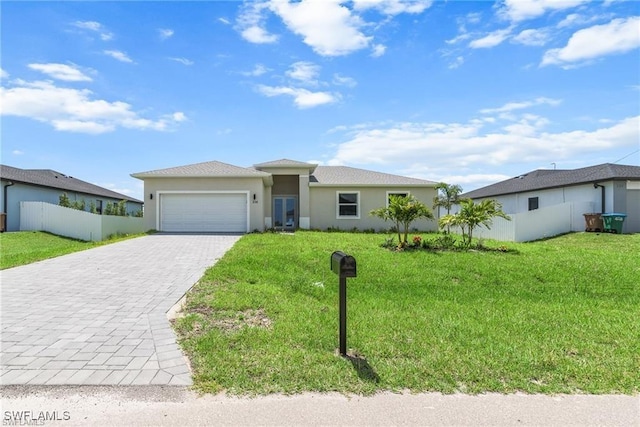 single story home featuring a front yard and a garage