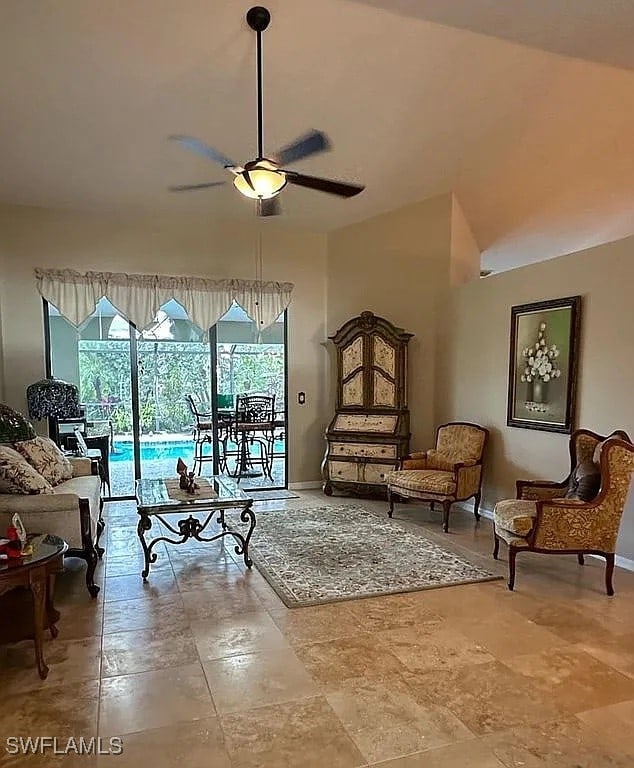 living room featuring ceiling fan