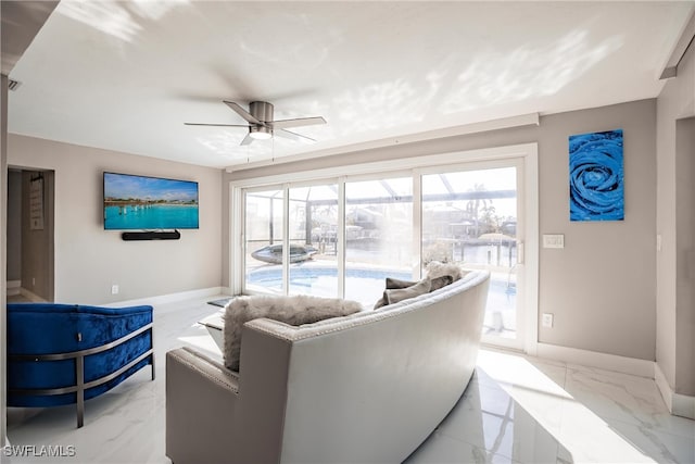 living room featuring ceiling fan