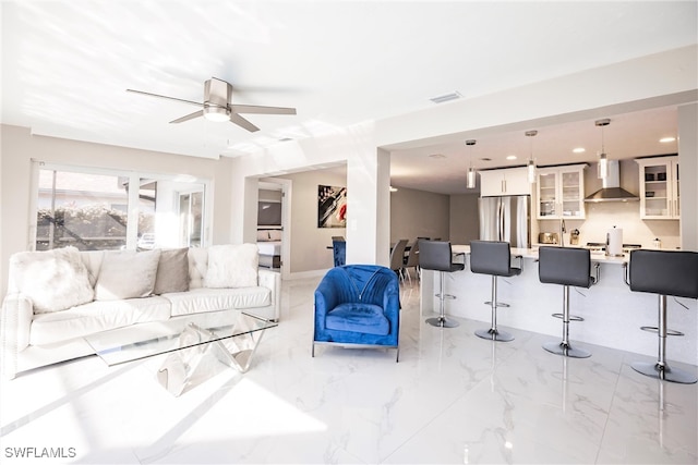 living room featuring ceiling fan