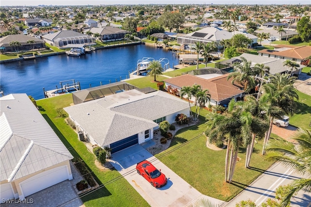 drone / aerial view with a water view