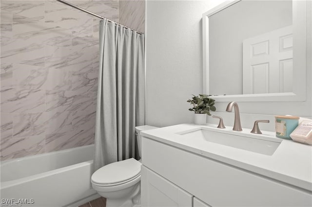full bathroom featuring vanity, shower / bath combination with curtain, and toilet