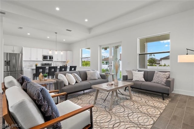 living room featuring plenty of natural light