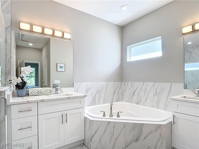 bathroom with plus walk in shower and vanity