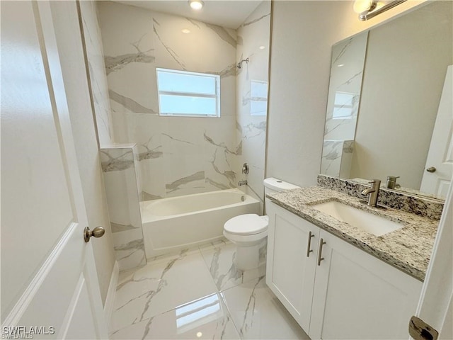 full bathroom featuring vanity, toilet, and tiled shower / bath