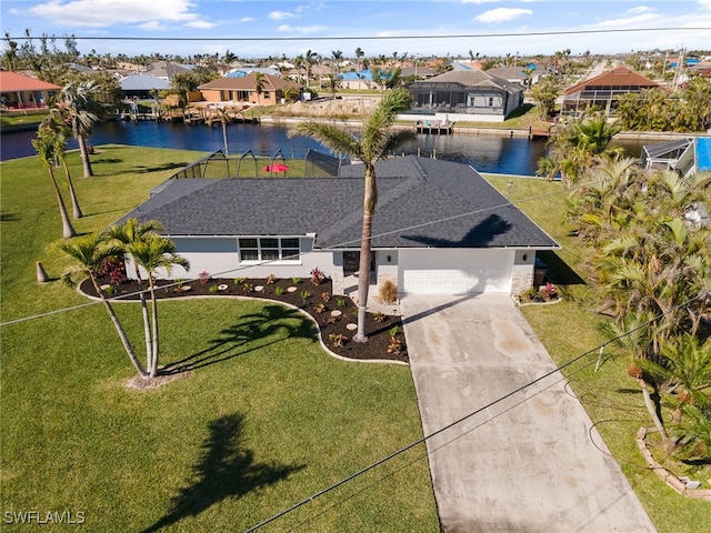 drone / aerial view featuring a water view