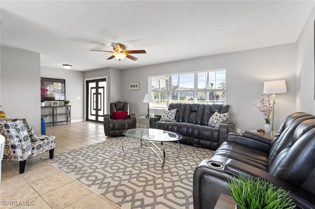 tiled living room with ceiling fan