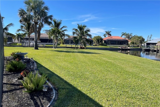 view of yard featuring a water view