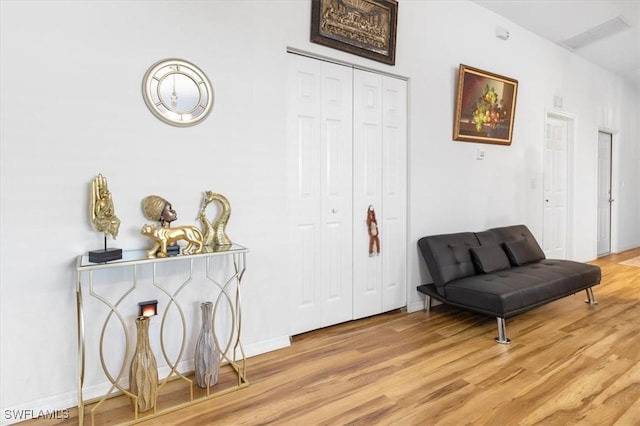 sitting room with light wood-type flooring