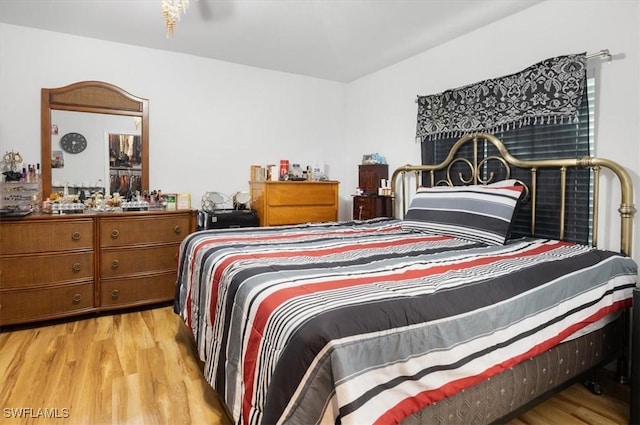 bedroom with light hardwood / wood-style flooring