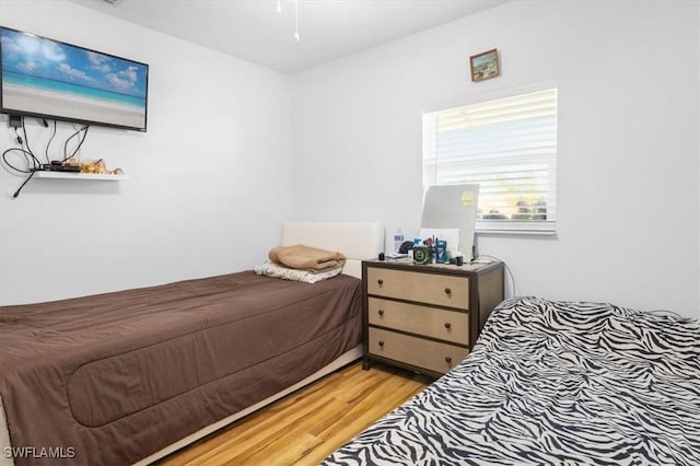 bedroom featuring light hardwood / wood-style floors