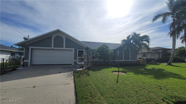 single story home with a front yard and a garage