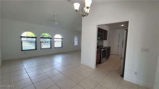 unfurnished room with ceiling fan with notable chandelier and light tile patterned floors