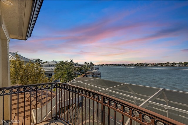 balcony at dusk with a water view