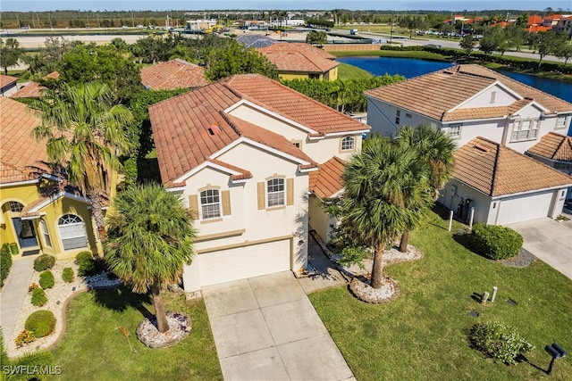 bird's eye view with a water view