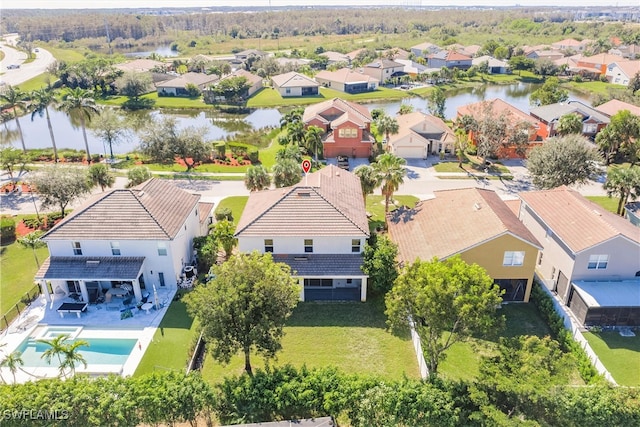 drone / aerial view featuring a water view