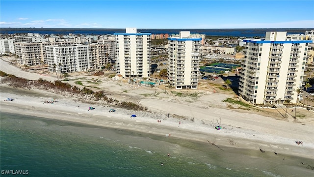 aerial view featuring a water view and a beach view