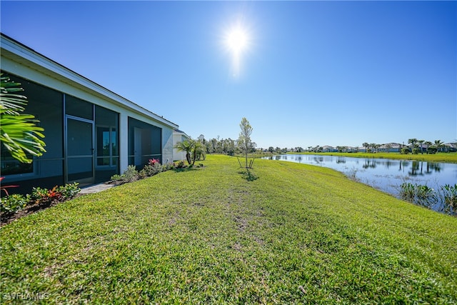 view of yard featuring a water view