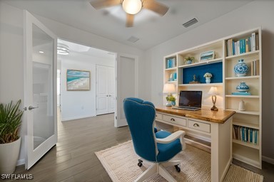 office featuring ceiling fan and hardwood / wood-style floors