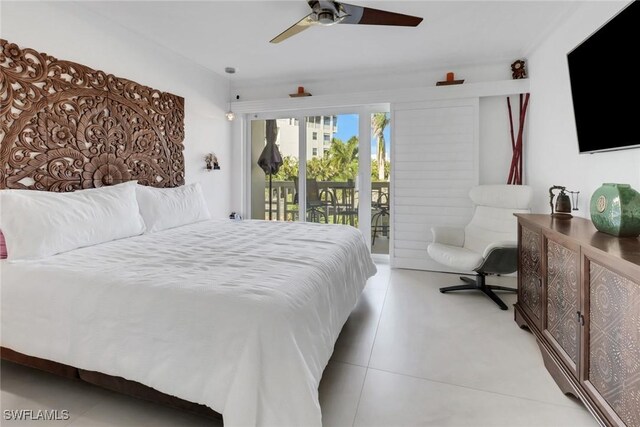 tiled bedroom featuring ceiling fan and access to exterior