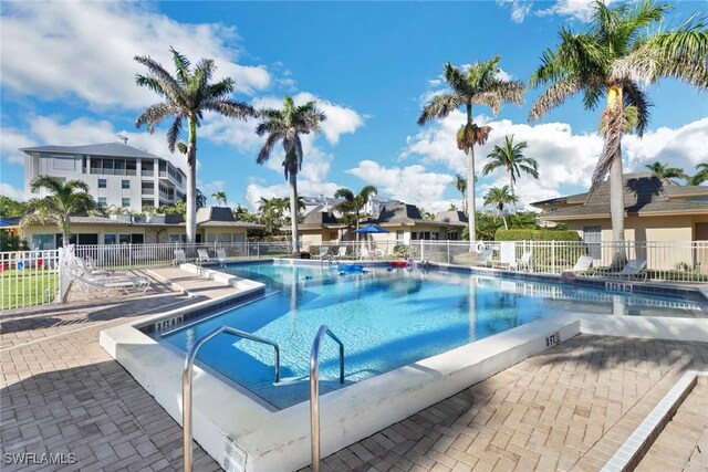 view of swimming pool with a patio area