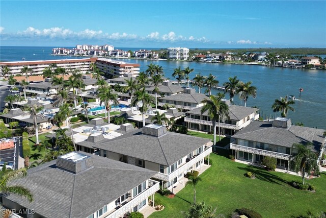 birds eye view of property featuring a water view