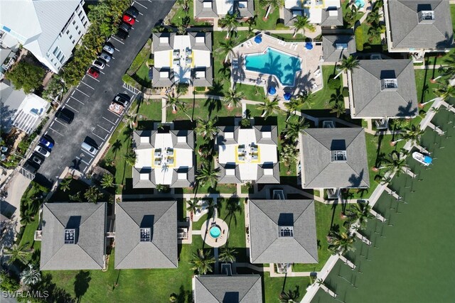 birds eye view of property featuring a water view