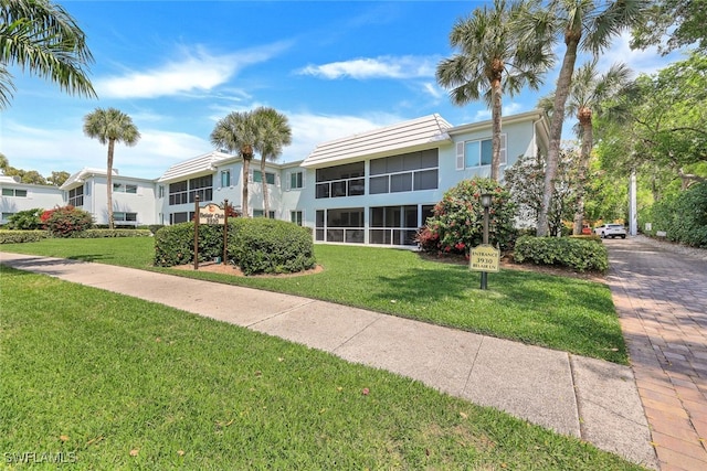 view of front of house with a front lawn