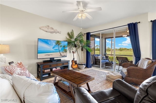 living area featuring a ceiling fan