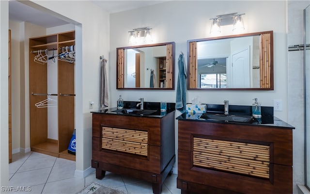 bathroom with tile patterned floors and vanity