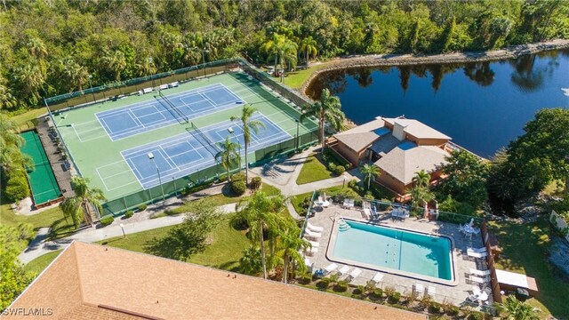 drone / aerial view with a water view