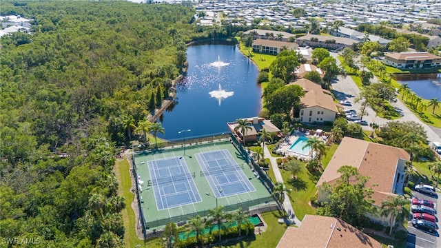 aerial view featuring a residential view and a water view