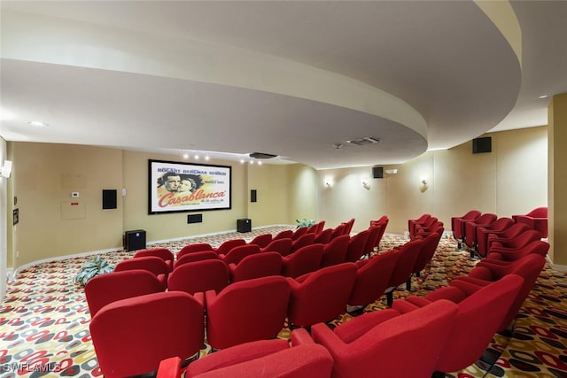 home theater featuring carpet