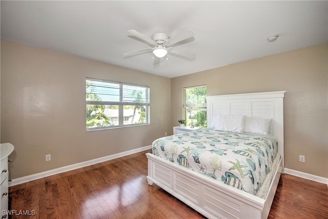 bedroom featuring hardwood / wood-style floors and ceiling fan