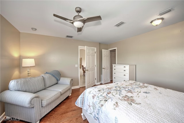 bedroom featuring ceiling fan and wood-type flooring