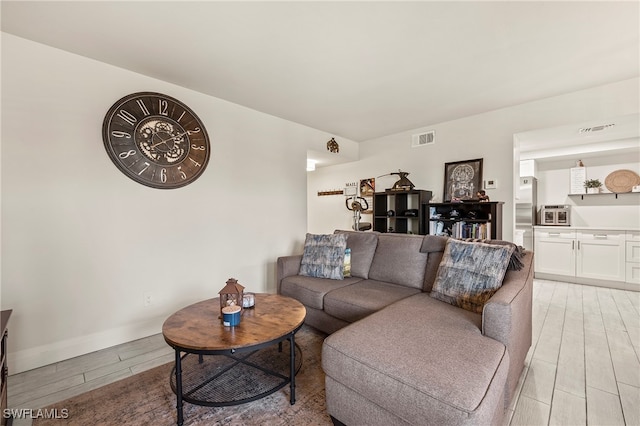 living room featuring light hardwood / wood-style floors