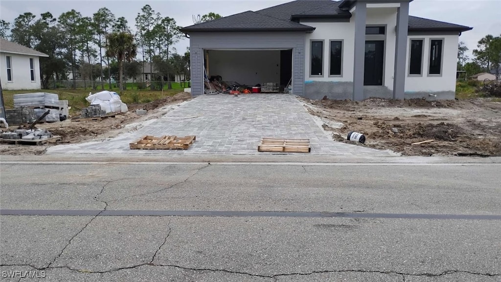 view of property exterior with a garage