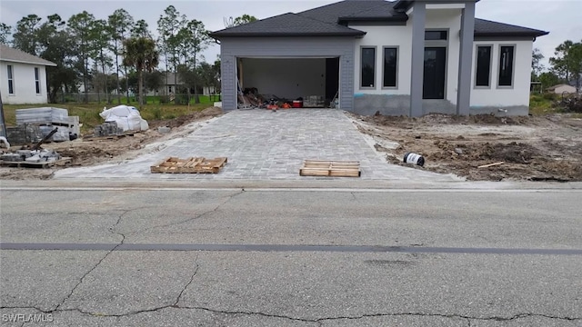 view of property exterior with a garage