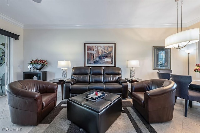 living area with crown molding and light tile patterned floors