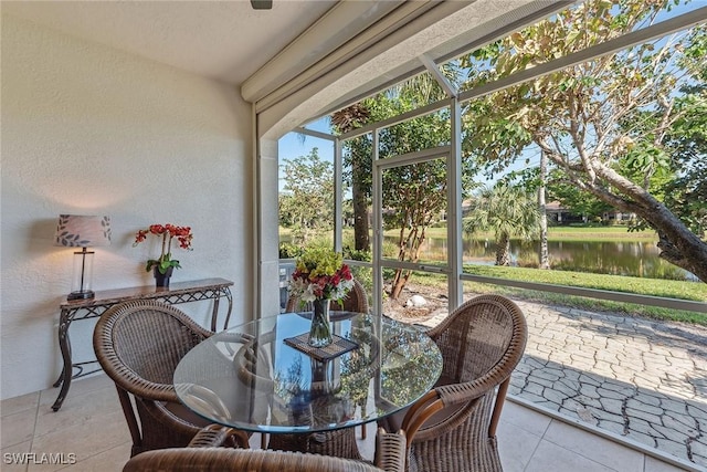 sunroom with a water view