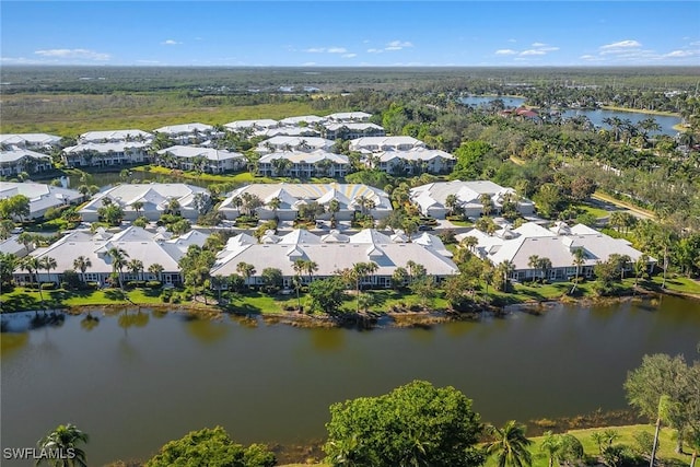 aerial view with a residential view and a water view