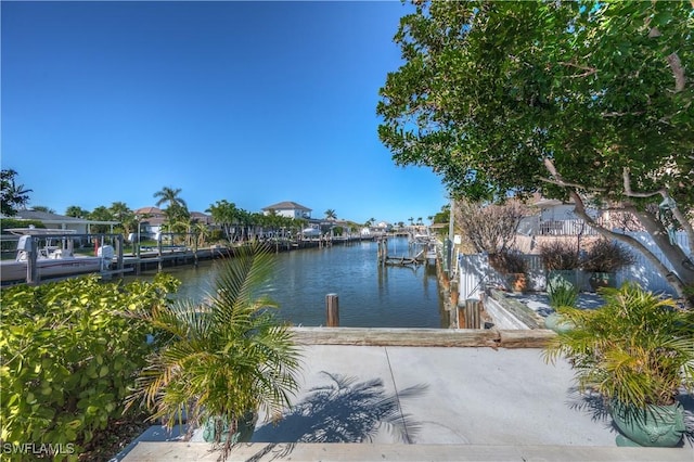 water view featuring a dock