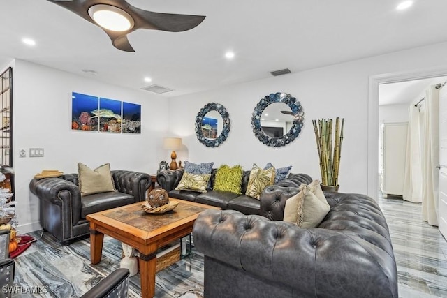 living area featuring ceiling fan, wood finished floors, visible vents, and recessed lighting