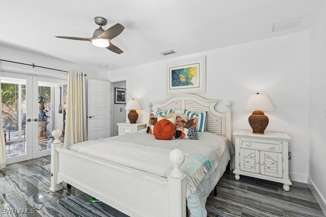 bedroom with french doors, visible vents, wood finished floors, access to outside, and baseboards