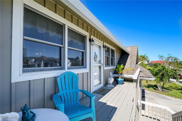 wooden deck featuring covered porch