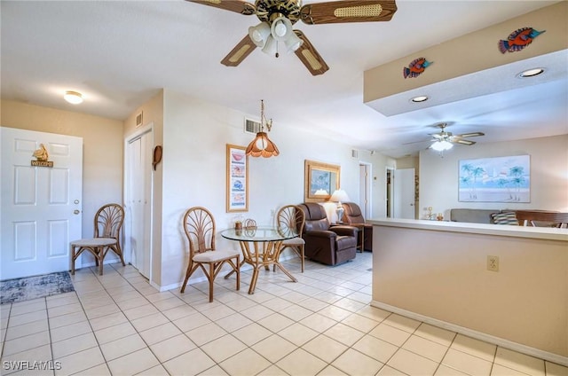 interior space featuring ceiling fan