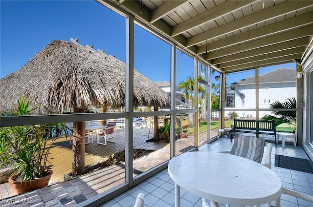 sunroom / solarium with beamed ceiling and wood ceiling