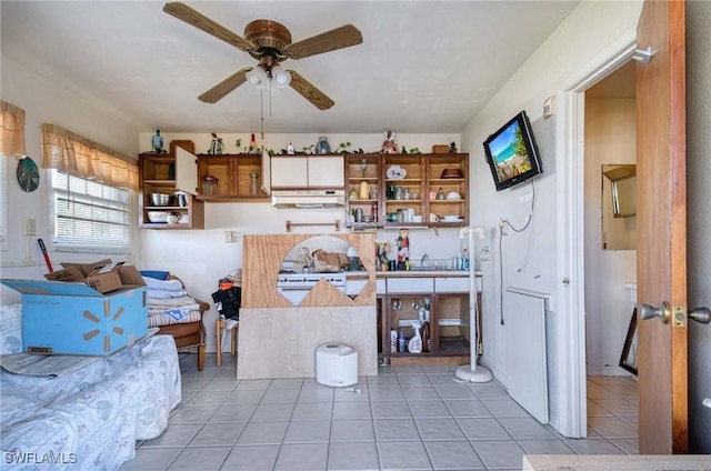 kitchen featuring tile patterned floors and ceiling fan